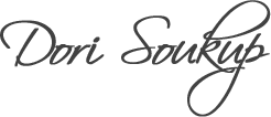Dori Soukup's Signature in Cursive Text
